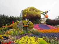 National Day themed flower beds are displayed along Chang'an Avenue in Beijing, China, on September 27, 2024. (