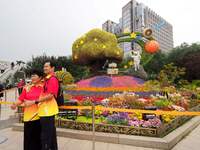 National Day themed flower beds are displayed along Chang'an Avenue in Beijing, China, on September 27, 2024. (