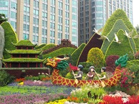 National Day themed flower beds are displayed along Chang'an Avenue in Beijing, China, on September 27, 2024. (