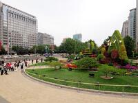 National Day themed flower beds are displayed along Chang'an Avenue in Beijing, China, on September 27, 2024. (