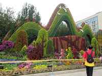 National Day themed flower beds are displayed along Chang'an Avenue in Beijing, China, on September 27, 2024. (