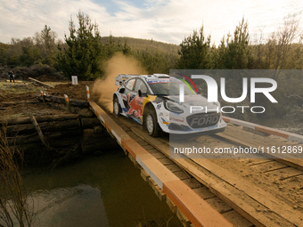 Driver Gregoire Munster and co-driver Louis Louka of the team M-Sport Ford World Rally Team Ford Puma Rally1 Hybrid face shakedown during FI...