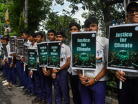 School students protest during the Global Climate Strike 2024 in Kolkata, India, on September 27, 2024. (