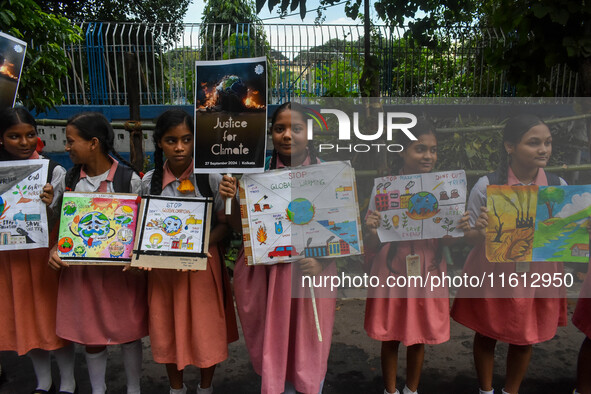 School students protest during the Global Climate Strike 2024 in Kolkata, India, on September 27, 2024. 