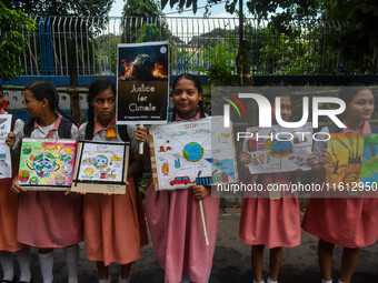 School students protest during the Global Climate Strike 2024 in Kolkata, India, on September 27, 2024. (