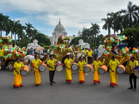 Dhakis play Dhak in front of Victoria Memorial Hall during the observation of World Tourism Day in Kolkata, India, on September 27, 2024. (