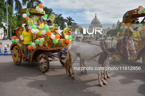 Citizens observe World Tourism Day in front of Victoria Memorial Hall in Kolkata, India, on September 27, 2024. 