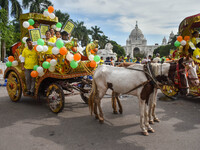 Citizens observe World Tourism Day in front of Victoria Memorial Hall in Kolkata, India, on September 27, 2024. (