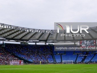 Players of both teams observe a minutes silence in memory of Toto' Schillacduring the Serie A Enilive match between AS Roma and Udinese Calc...