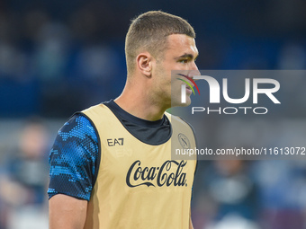 Alessandro Buongiorno of SSC Napoli warms up before the Coppa Italia match between SSC Napoli and Palermo FC at Stadio Diego Armando Maradon...