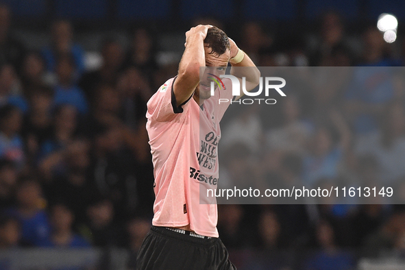 Jeremy Le Douaron of Palermo FC looks dejected during the Coppa Italia match between SSC Napoli and Palermo FC at Stadio Diego Armando Marad...