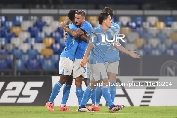 David Neres of SSC Napoli celebrates with team mates after scoring during the Coppa Italia match between SSC Napoli and Palermo FC at Stadio...