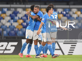 David Neres of SSC Napoli celebrates with team mates after scoring during the Coppa Italia match between SSC Napoli and Palermo FC at Stadio...