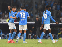 David Neres of SSC Napoli celebrates with team mates after scoring during the Coppa Italia match between SSC Napoli and Palermo FC at Stadio...