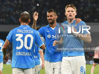 Scott McTominay of SSC Napoli celebrates with team mates after scoring during the Coppa Italia match between SSC Napoli and Palermo FC at St...