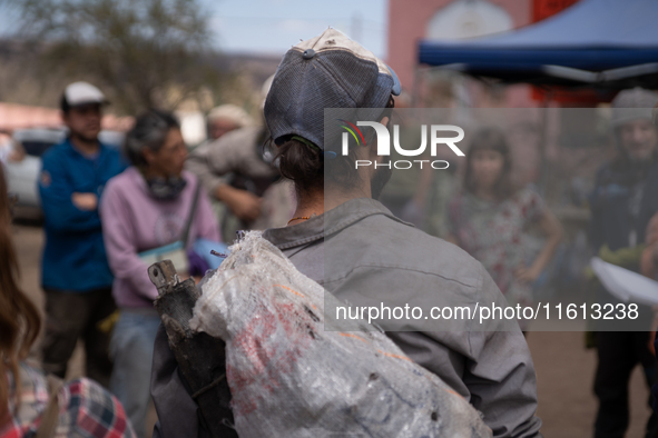 Brigade members from the San Isabel neighborhood, just a few kilometers from downtown Capilla del Monte, prepare to combat the few remaining...