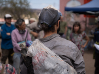 Brigade members from the San Isabel neighborhood, just a few kilometers from downtown Capilla del Monte, prepare to combat the few remaining...