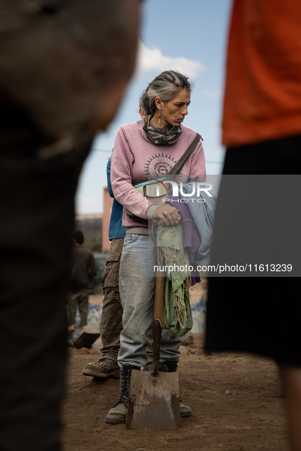 Brigade members from the San Isabel neighborhood, just a few kilometers from downtown Capilla del Monte, prepare to combat the few remaining...