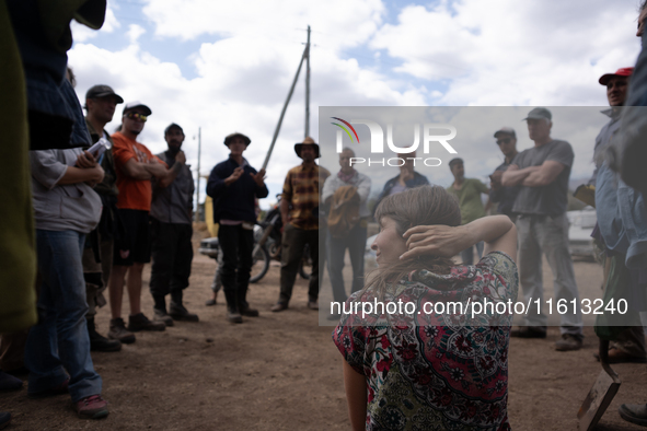 Brigade members from the San Isabel neighborhood, just a few kilometers from downtown Capilla del Monte, prepare to combat the few remaining...