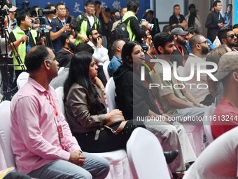 Foreign businessmen attend the opening ceremony of the 17th China Handan (Yongnian) Fastener and Equipment Exhibition in Handan, China, on S...