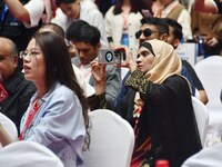 Foreign businessmen attend the opening ceremony of the 17th China Handan (Yongnian) Fastener and Equipment Exhibition in Handan, China, on S...