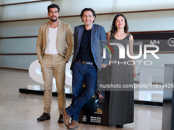 Anna Castillo, Mario Casas, and Rodrigo Cortes attend the photocall for ''Escape'' during the 72nd San Sebastian International Film Festival...