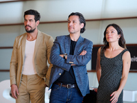 Anna Castillo, Mario Casas, and Rodrigo Cortes attend the photocall for ''Escape'' during the 72nd San Sebastian International Film Festival...