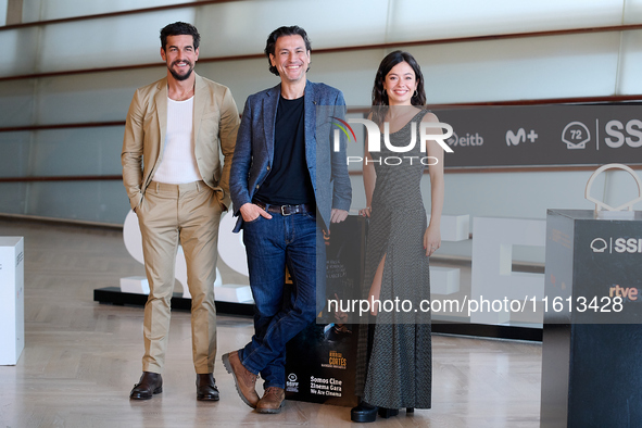 Anna Castillo, Mario Casas, and Rodrigo Cortes attend the photocall for ''Escape'' during the 72nd San Sebastian International Film Festival...