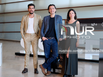 Anna Castillo, Mario Casas, and Rodrigo Cortes attend the photocall for ''Escape'' during the 72nd San Sebastian International Film Festival...