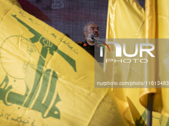 Deputy commander-in-chief of the Islamic Revolutionary Guard Corps (IRGC), Ali Fadavi, speaks in an anti-Israeli protest to condemn Israel's...