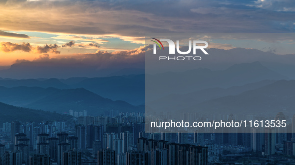 A photo taken on September 27, 2024, shows flow cloud at the main peak of the north slope of Jinfo Mountain in Chongqing, China. 