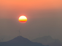 The photo shows the sunrise at Yonglongshan Forest Park in Chongqing, China, on September 27, 2024. (