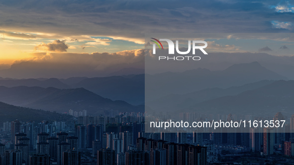 A photo taken on September 27, 2024, shows flow cloud at the main peak of the north slope of Jinfo Mountain in Chongqing, China. 