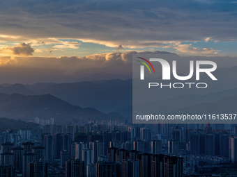 A photo taken on September 27, 2024, shows flow cloud at the main peak of the north slope of Jinfo Mountain in Chongqing, China. (