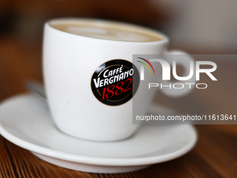 Caffe Vergnano logo is seen on a cup of cappucino in this illustration photo taken at a cafe in Krakow, Poland on September 26, 2024. (