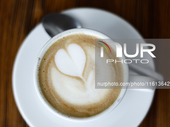 A cup of cappucino is seen in this illustration photo taken at a cafe in Krakow, Poland on September 26, 2024. (