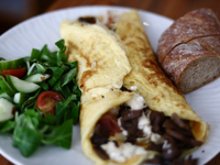 An omelette with goat cheese, beacon and mushrooms is seen in this illustration photo taken in a cafe Krakow, Poland on September 26, 2024....