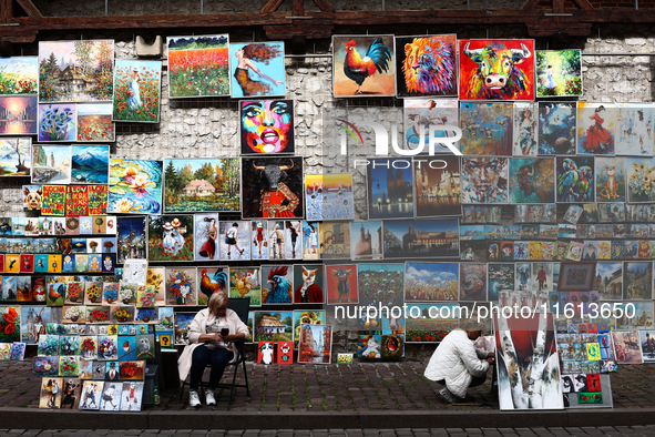 A view of the street gallery with paintings in Krakow in Krakow, Poland on September 26, 2024. 