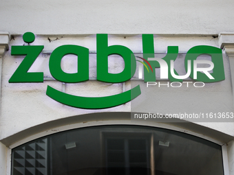 Zabka logo is seen on the store in Krakow, Poland on September 26, 2024. (