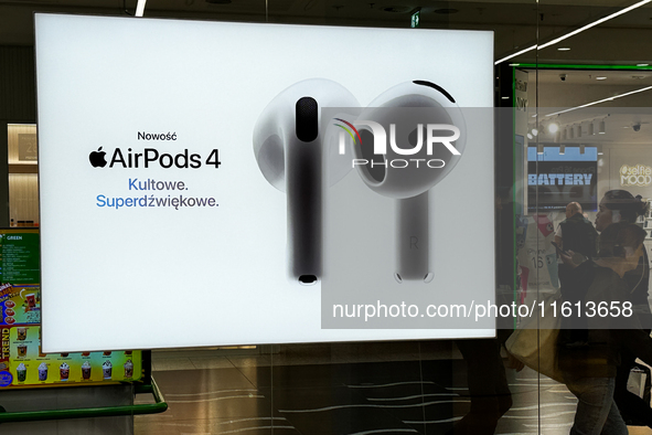 Apple AirPods 4 ad is seen on a store in Krakow, Poland on September 26, 2024. 