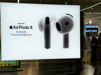 Apple AirPods 4 ad is seen on a store in Krakow, Poland on September 26, 2024. (