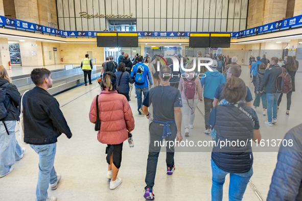 Competitors gather at the historic Tempelhof Airport in Berlin, Germany, on September 27, 2024, in preparation for the 50th edition of the B...