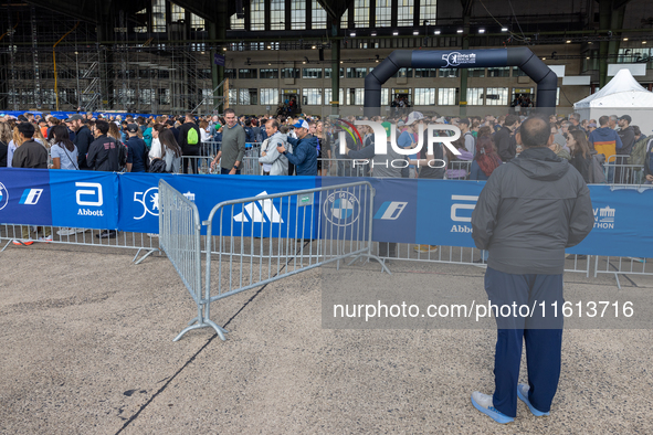 Competitors gather at the historic Tempelhof Airport in Berlin, Germany, on September 27, 2024, in preparation for the 50th edition of the B...