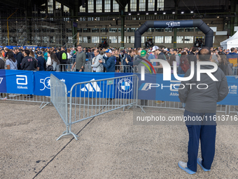 Competitors gather at the historic Tempelhof Airport in Berlin, Germany, on September 27, 2024, in preparation for the 50th edition of the B...