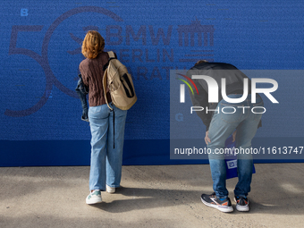 Competitors gather at the historic Tempelhof Airport in Berlin, Germany, on September 27, 2024, in preparation for the 50th edition of the B...