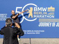 Competitors gather at the historic Tempelhof Airport in Berlin, Germany, on September 27, 2024, in preparation for the 50th edition of the B...