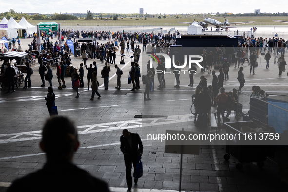 Competitors gather at the historic Tempelhof Airport in Berlin, Germany, on September 27, 2024, in preparation for the 50th edition of the B...