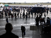 Competitors gather at the historic Tempelhof Airport in Berlin, Germany, on September 27, 2024, in preparation for the 50th edition of the B...