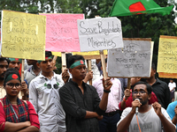 Activists of the Minority Rights Movement hold a protest rally before a torch march demanding justice for the attacks on the minority commun...