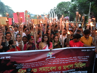 Activists of the Minority Rights Movement hold a torch march demanding justice for the attacks on the minority community in various parts of...